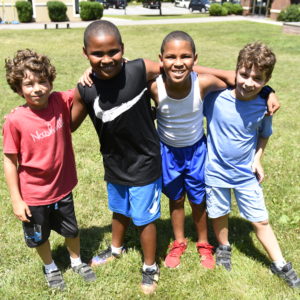 Four Harvey Summer Campers on the Harvey Campus