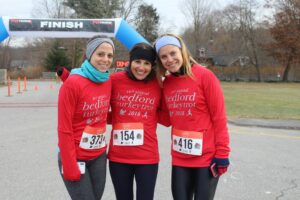 Bedford Turkey Trot What To Do Thanksgiving Weekend 2019 3 Women pose for picture after run
