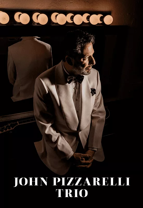 World-renowned Guitarist and singer John Pizzarelli has been hailed by the Boston Globe for “reinvigorating the Great American Songbook and re-popularizing jazz.” Established as one of the prime contemporary interpreters of the Great American Songbook, Pizzarelli has expanded that repertoire by including the music of Paul McCartney, Joni Mitchell, Neil Young, Tom Waits, Antônio Carlos Jobim and the Beatles.